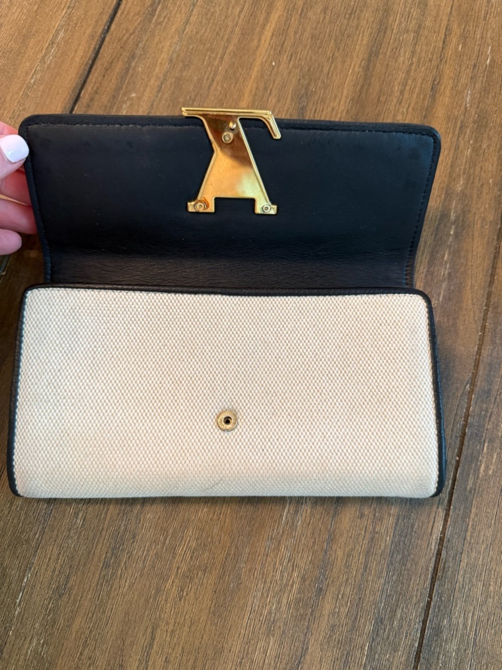 Louis Vuitton Capucines Wallet with Black Trim and Gold LV Emblem - Picture 5 of 10